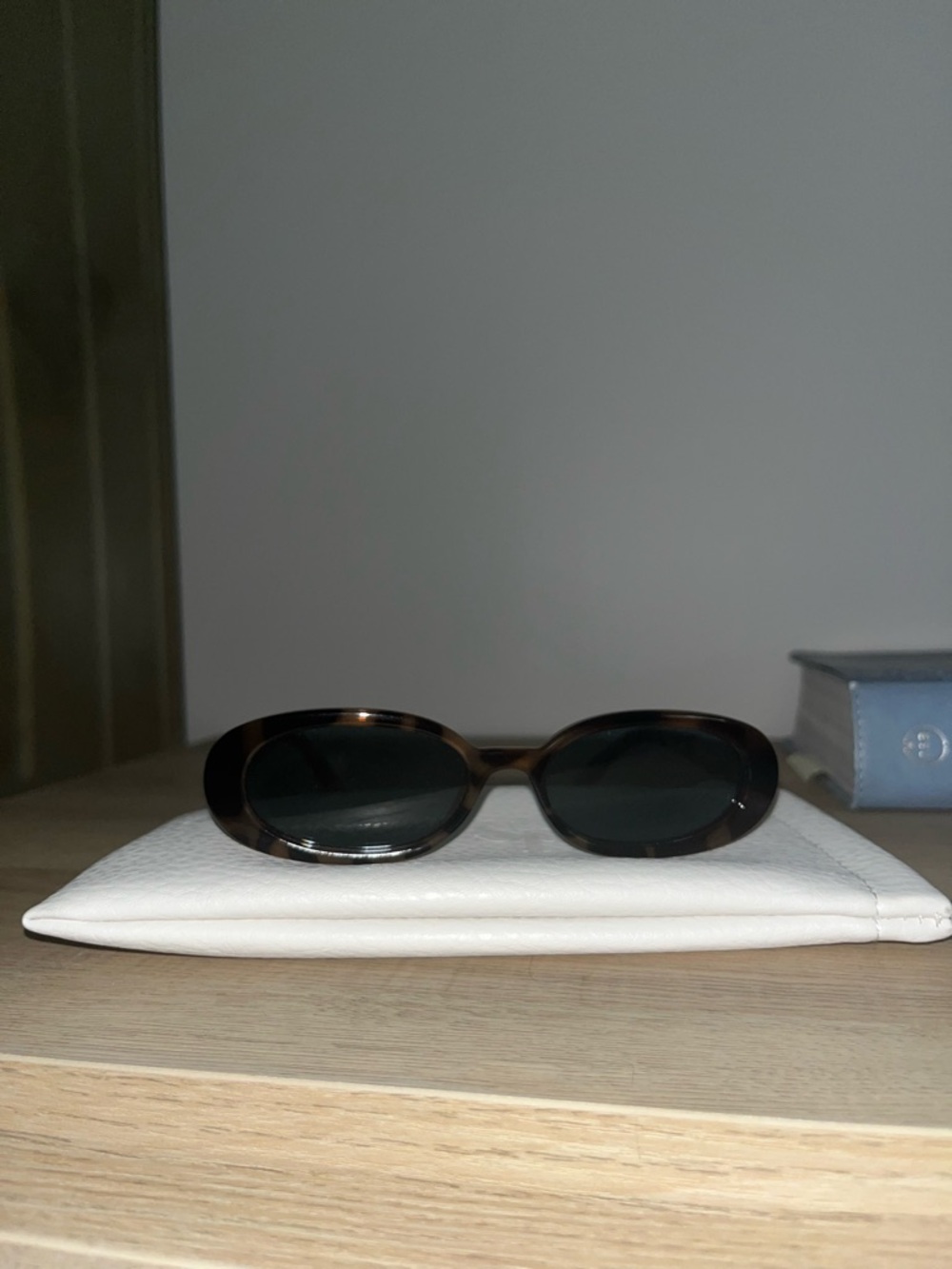 Le Specs Tortoiseshell Oval Sunglasses with Dark Lenses